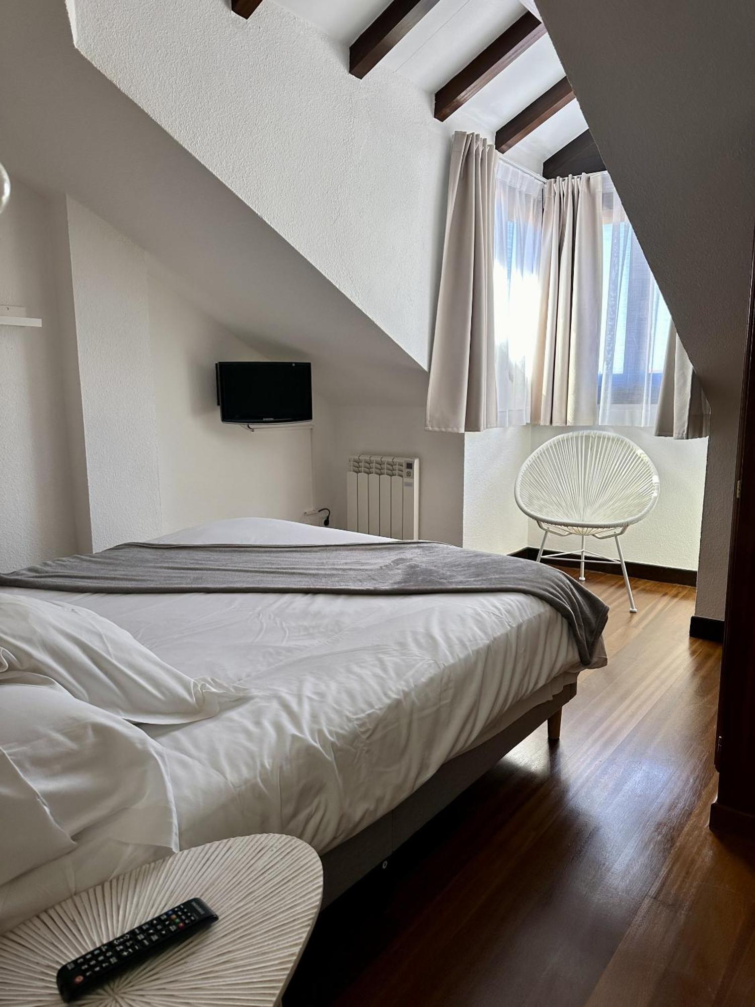 Apartamentos Val De Comillas Pokoj fotografie