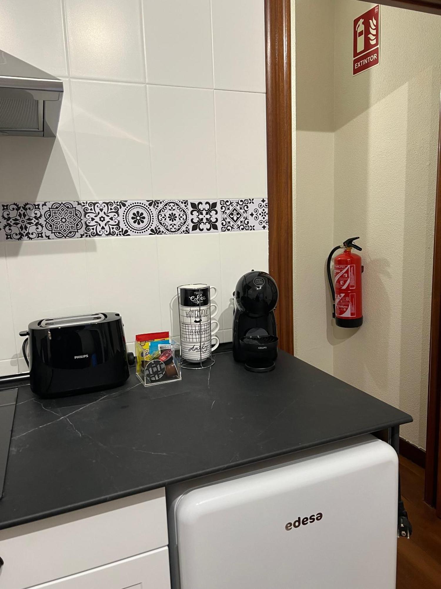 Apartamentos Val De Comillas Pokoj fotografie